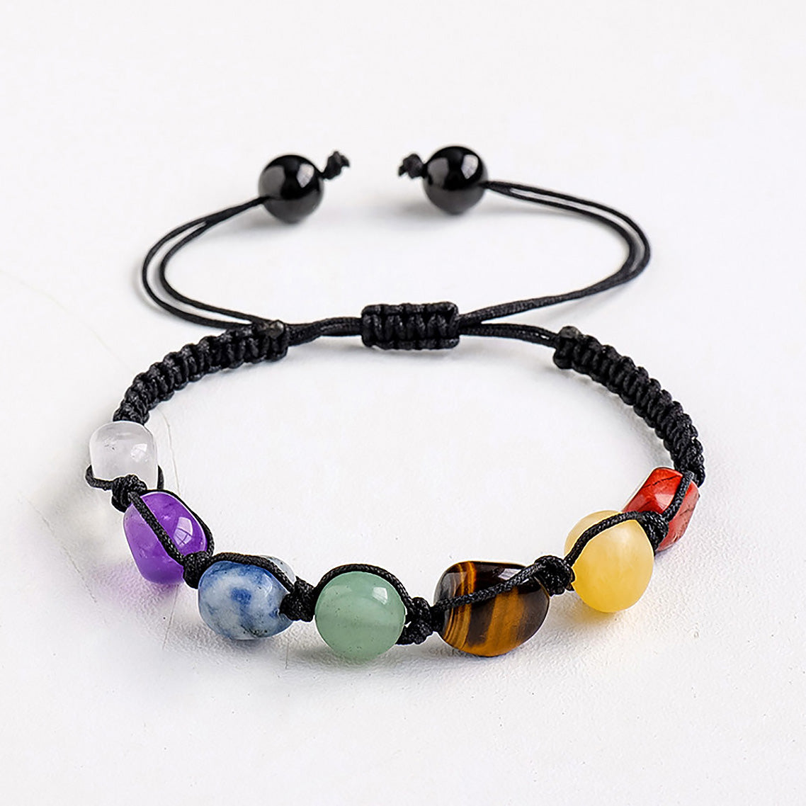 The bracelet features seven gemstones of different colors, showcasing rich colors and a unique design style.